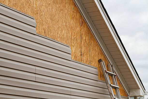 Professional Siding Contractor technician working in West Liberty, WV